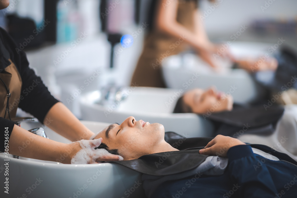client woman clean washing a hair in salon, professional hairdresser washing haircut customer hair with water and shampoo treatment, coiffure beauty head hair care, fashion service