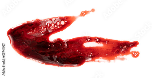 Dripping blood isolated on white background. Flowing bloody stains, splashes and drops. Trail and drips red blood close up. © Илья Подопригоров