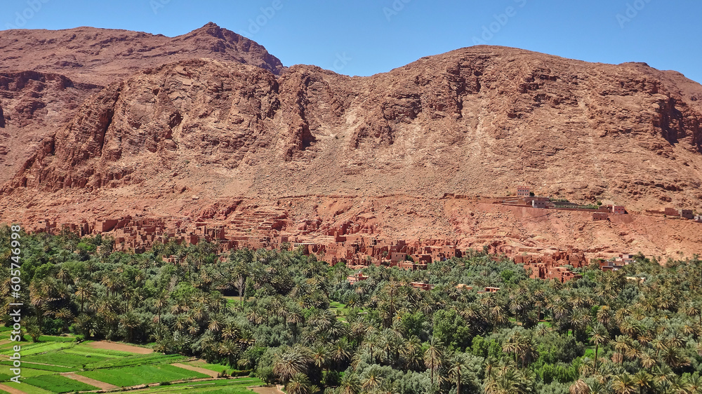 Beautiful desert Oasis in Morocco with date palm trees. Beautiful desert Oasis in Morocco with date palm trees.