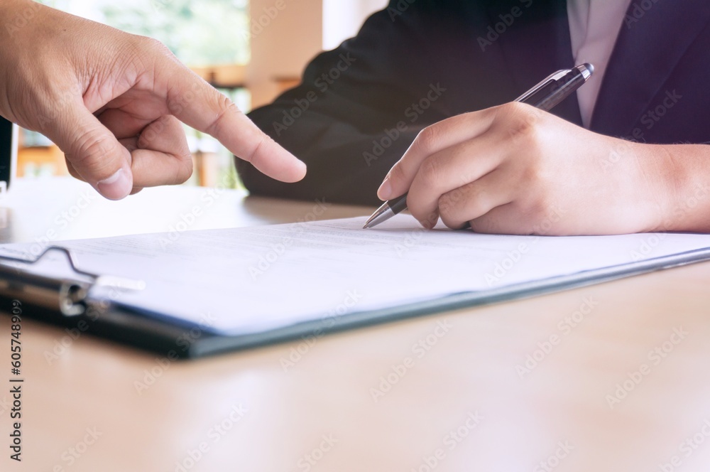 Man Completing Application Form during job interview. human resources concept. Man Completing Application Form during job interview. human resources concept.