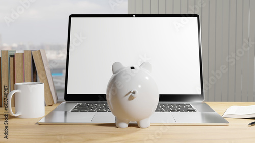 White piggy bank looking at a laptop