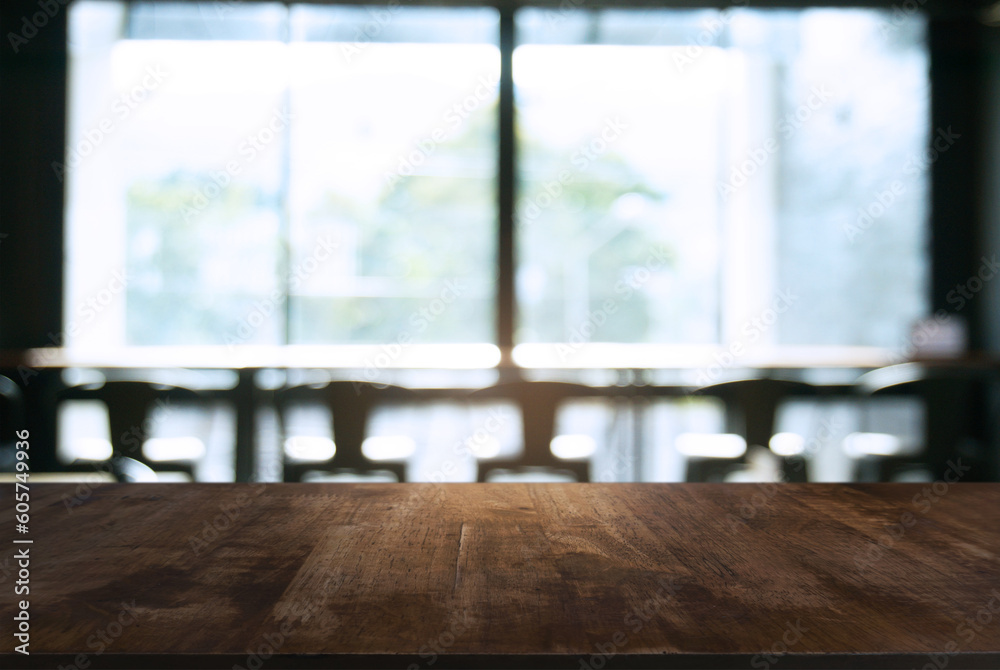 Empty wooden table in front of abstract blurred background of coffee shop . can be used for display Mock up of product Empty wooden table in front of abstract blurred background of coffee shop . can be used for display Mock up of product