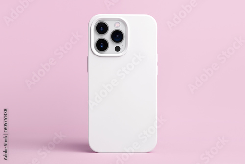iPhone 14 pro max starlight in white case back view, phone cover mockup isolated on pink background
