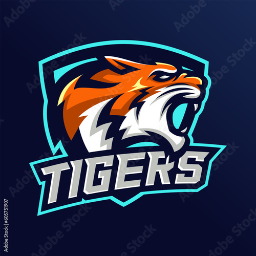 Tiger esport gaming mascot logo design. Angry roaring tiger head badge vector icon