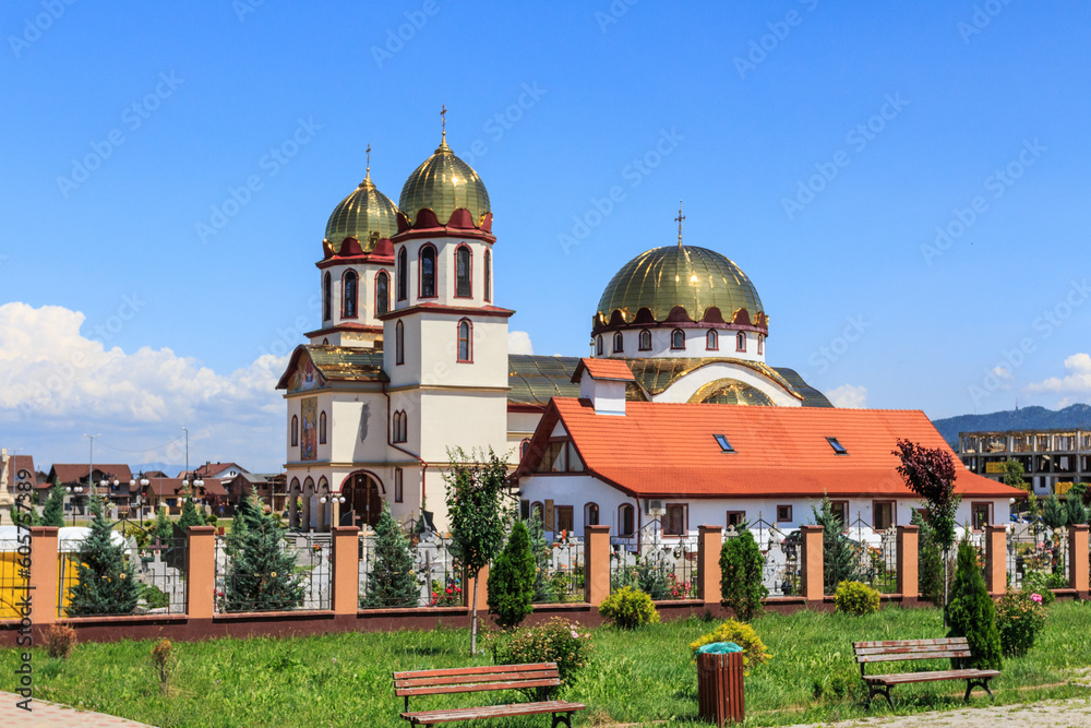 View of a church with golden domes in Transylvania. Romania