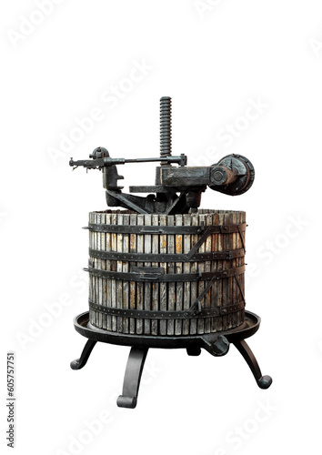 Old wine press isolated on white background. Vintage equipment for winemaking on a home winery. Old fashion wine making press with wooden cask and iron mechanery of hand screw.