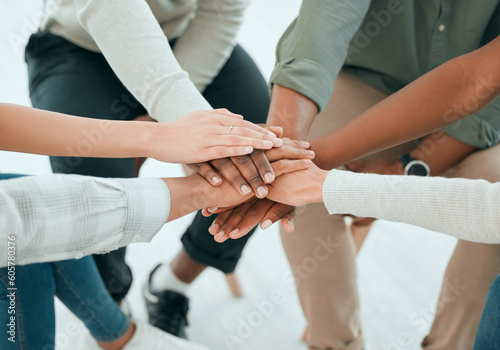 Hands stack, group and team with support, care and together with solidarity, advice and empathy at job. People, friends and helping hand for teamwork, commitment and community with trust in top view