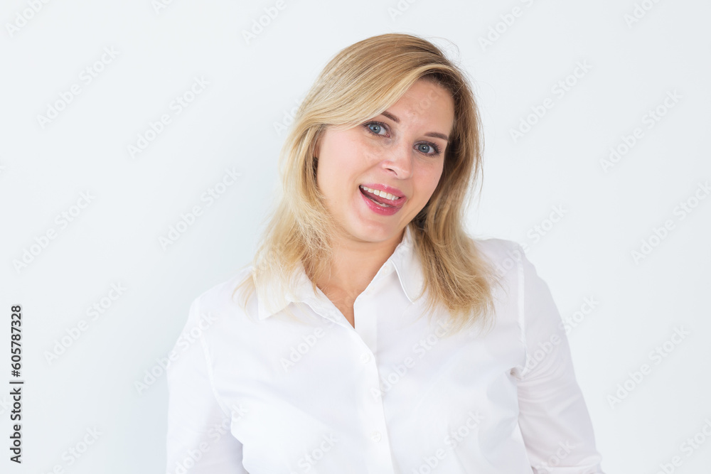 Funky flirty young woman lick teeth tongue smile isolated on white color background Funky flirty young woman lick teeth tongue smile isolated on white color background
