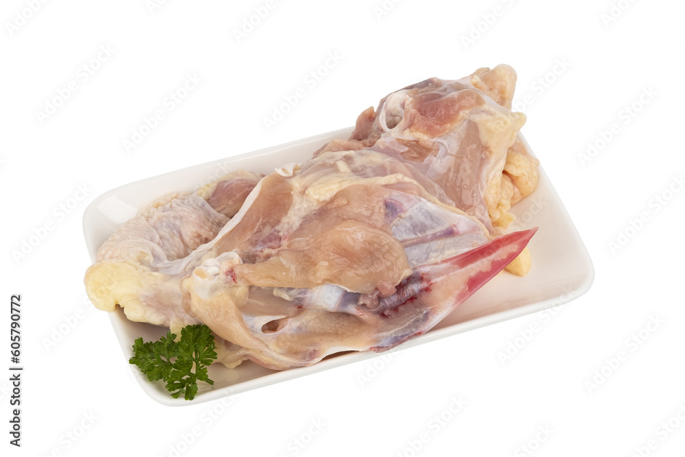 Raw Chicken frame or Chicken carcass in white plate isolated on white background with clipping path Raw Chicken frame or Chicken carcass in white plate isolated on white background with clipping path