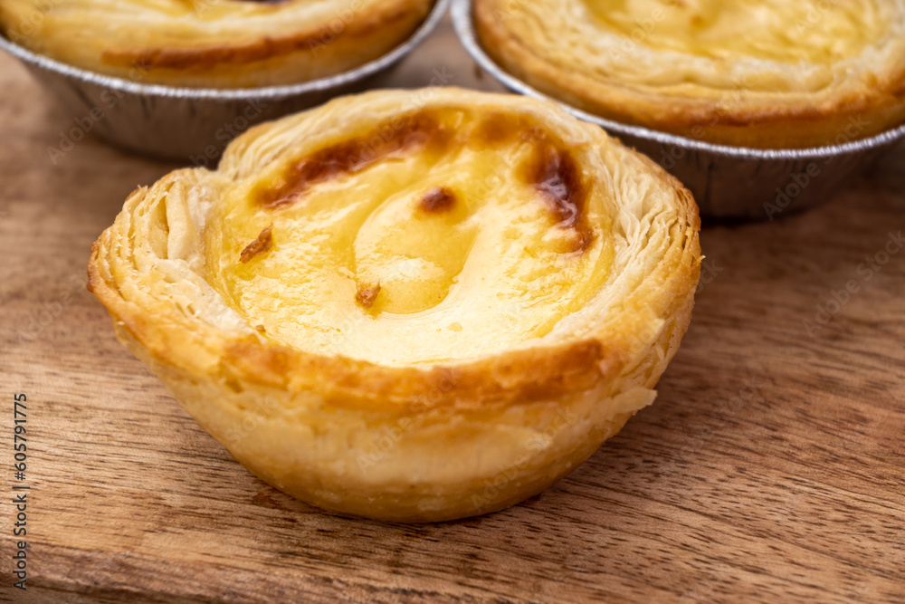 Portugal's traditional sweet dessert Pastel de nata egg custard tart pastry in cup Portugal's traditional sweet dessert Pastel de nata egg custard tart pastry in cup