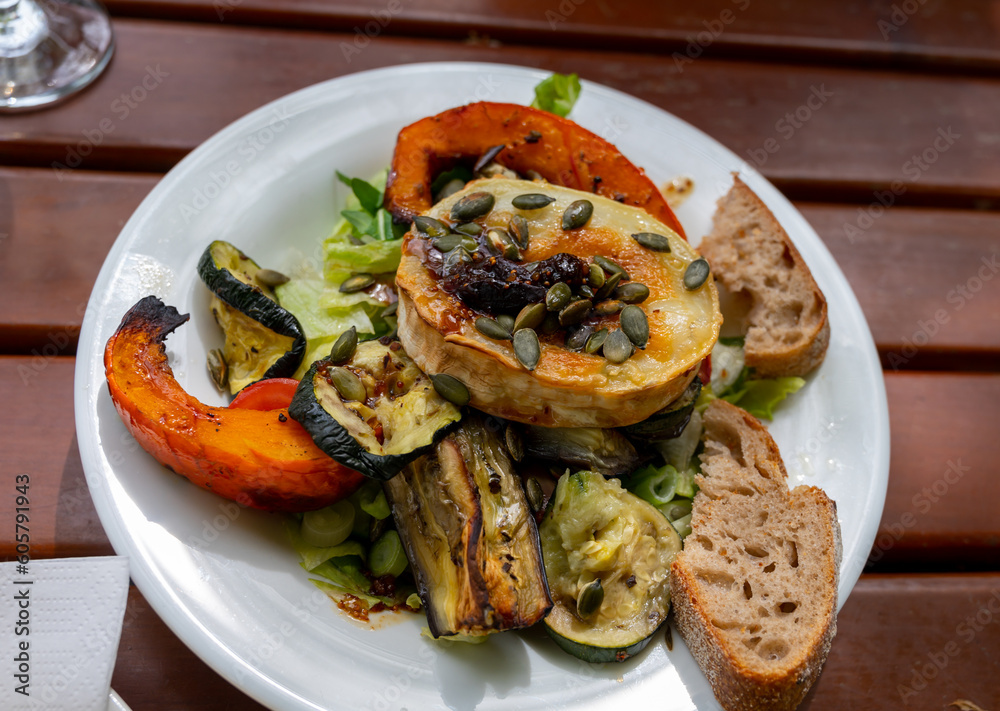 Healthy vegetarian food, Grilled vegetables with goat cheese salad Healthy vegetarian food, Grilled vegetables with goat cheese salad