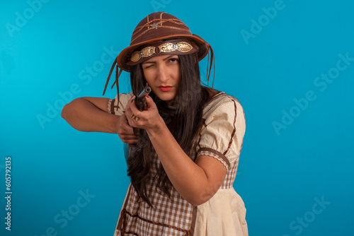 Young woman with festa junina outfit in studio