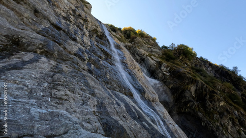 beautiful mountain ridge highland fast waterfall at summertime day - photo of nature