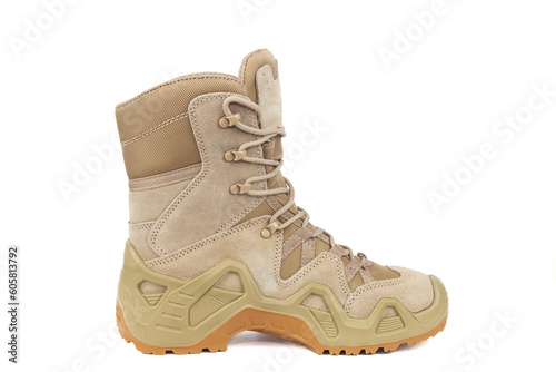 Tactical boots for the army are cut out on a white background. Isolated on a white background, no shadow. 