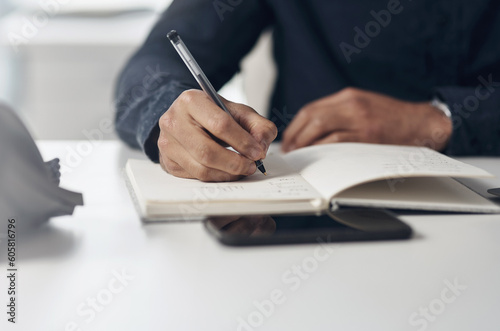 Notebook, planning and business man hands writing for creative ideas, project management and schedule or goals. Timeline, list and startup employee or person notes, journal and planner on his desk
