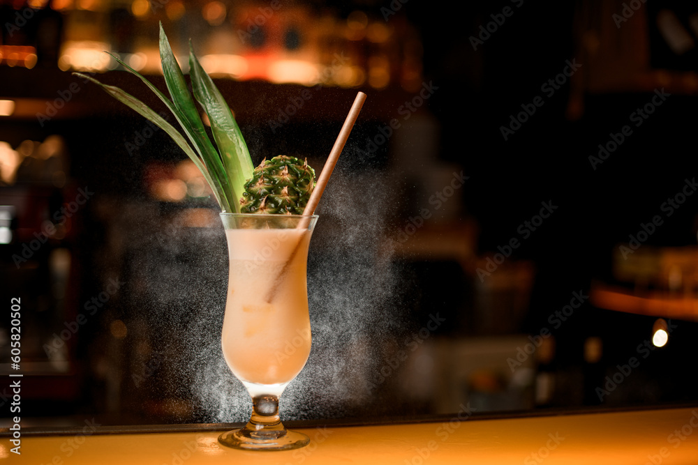 Pina colada delicious cocktail on bar counter. Cocktails at the disco