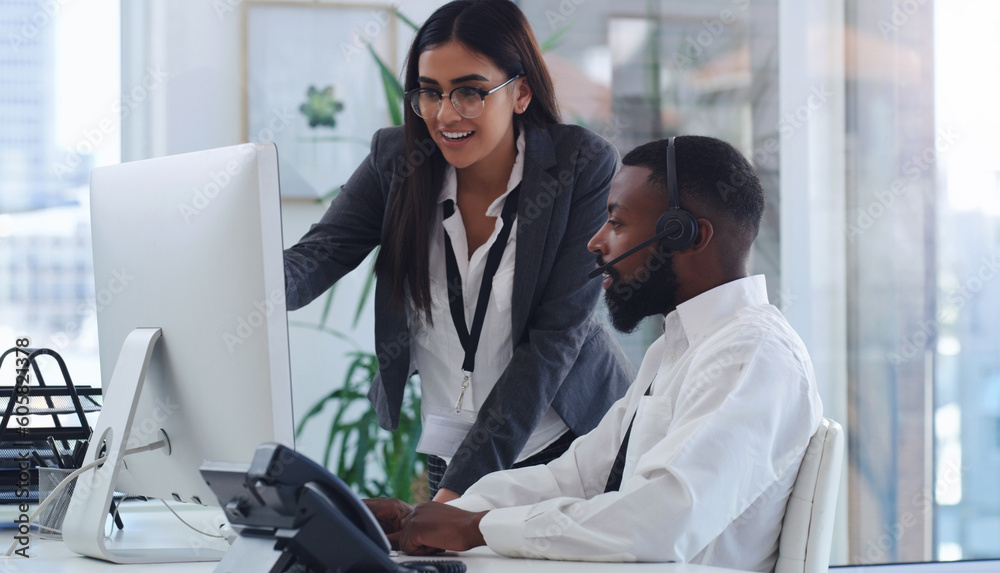 Black man, call center and woman with coach by computer, office or learning for tech support. African male crm, female mentor or teaching for telemarketing, training or customer service at help desk Black man, call center and woman with coach by computer, office or learning for tech support. African male crm, female mentor or teaching for telemarketing, training or customer service at help desk