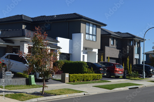 Houses in the suburbs on a sunny afternoon © Bruce