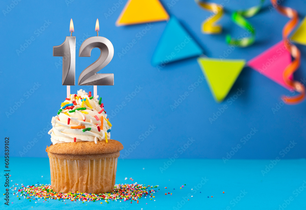 Birthday cake with candle number 12 - Blue background