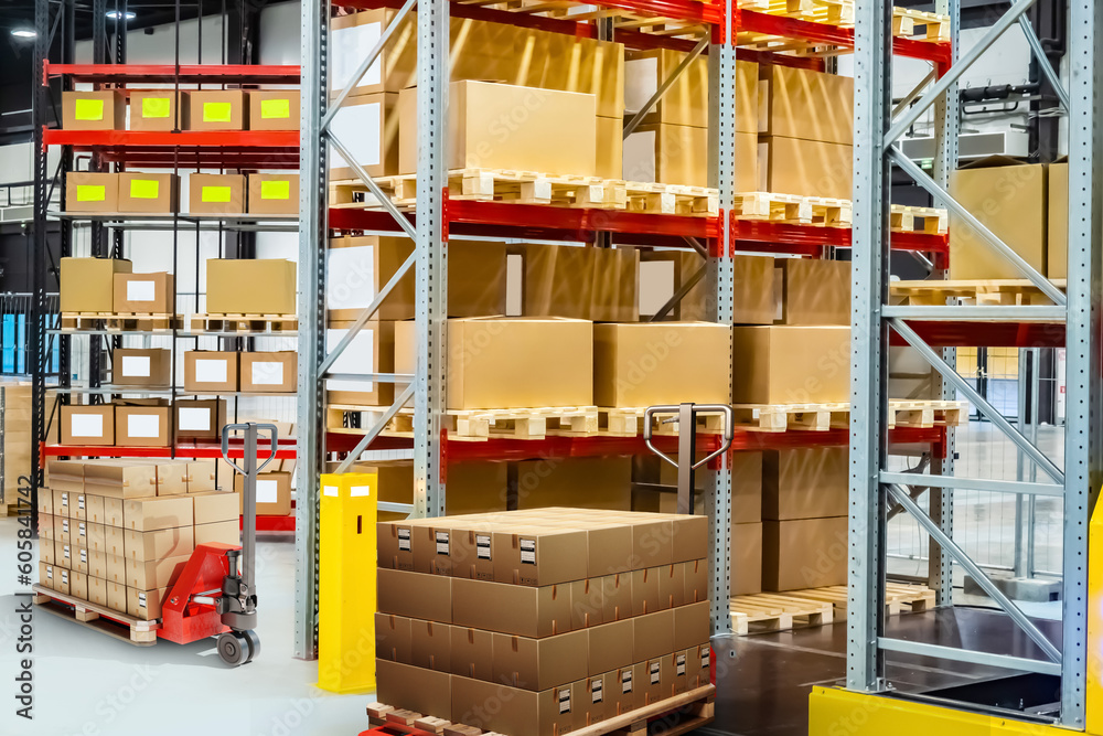 Obraz premium Warehouse area. Logistics center. Industrial storage. Warehouse with boxes. Cardboard parcels on racks. Warehouse interior. Pallet jack in storage building. Factory storage without anyone. 3d image