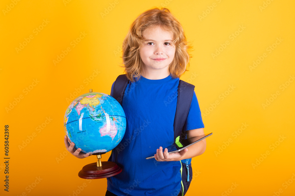 Fototapeta premium School boy world globe and tablet. Nerd pupil. Clever child from elementary school with book. Smart genius intelligence kid ready to learn.