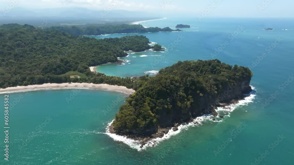 Aerial view of Manuel Antonio National Park in Costa Rica. The best Tourist Attraction and Nature Reserve with lots of Wildlife, Tropical Plants and paradisiacal Beaches on the Pacific Coast. Aerial view of Manuel Antonio National Park in Costa Rica. The best Tourist Attraction and Nature Reserve with lots of Wildlife, Tropical Plants and paradisiacal Beaches on the Pacific Coast.