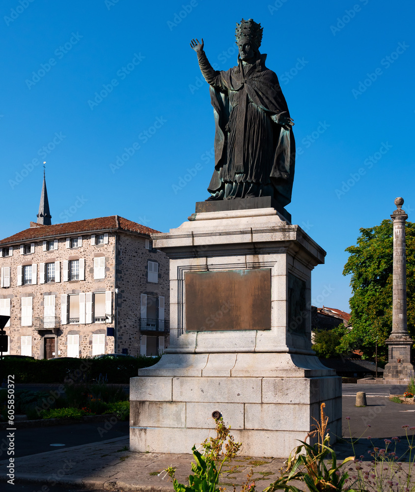 View of monument of Gerbert of Aurillac, ancient scholar, teacher and first French-borned pope Sylvester II in Aurillac town on sunny day, France