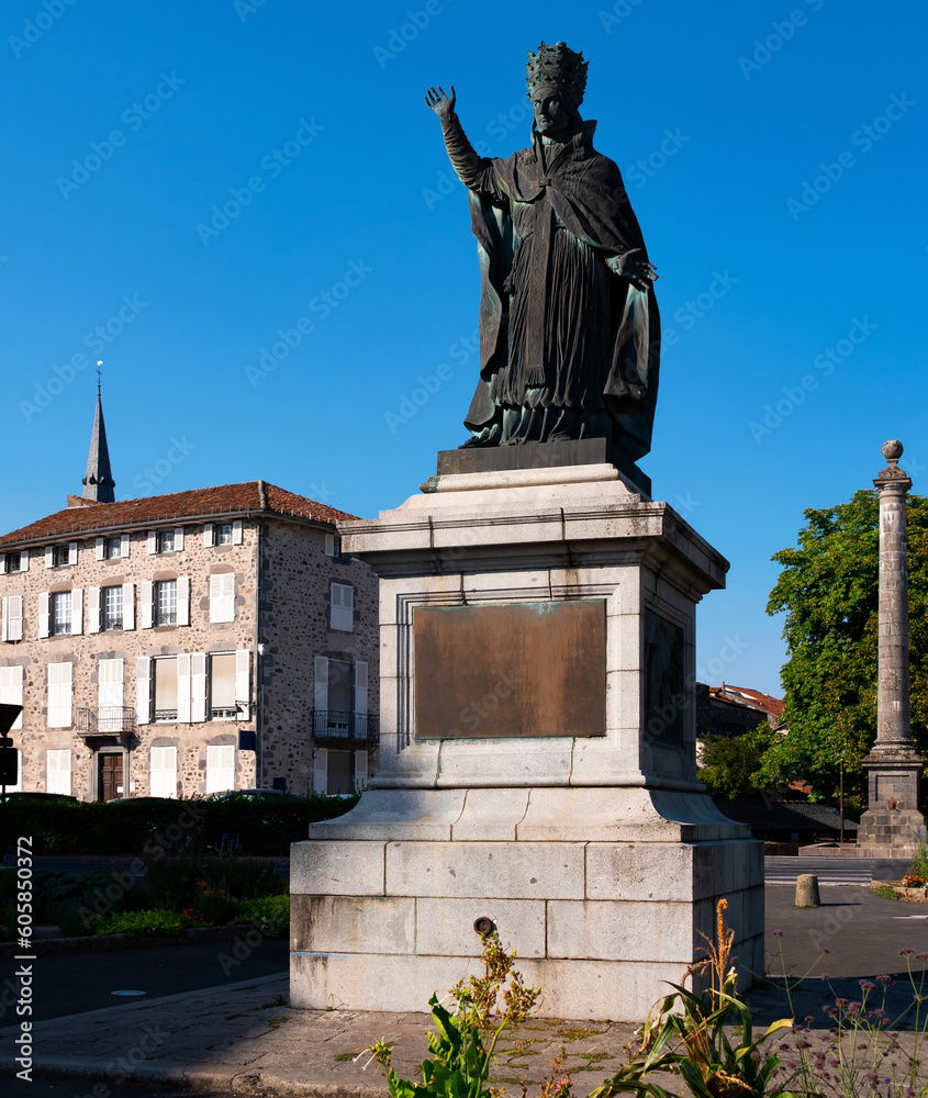 Fototapeta premium View of monument of Gerbert of Aurillac, ancient scholar, teacher and first French-borned pope Sylvester II in Aurillac town on sunny day, France