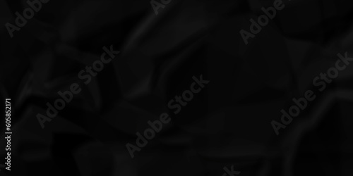 Black fabric wrinkled ripped texture and Crumpled black paper. Textured crumpled black paper background. 