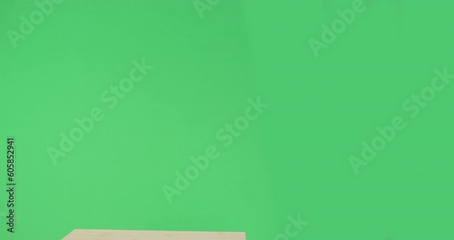 Dog in blue T-shirt at school desk looks around in embarrassment, confusion, first grader has difficulty concentrating. Fidget student looking back at exam, adhd, clip thinking, attention deficit