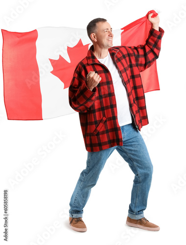 Mature man with flag of Can...