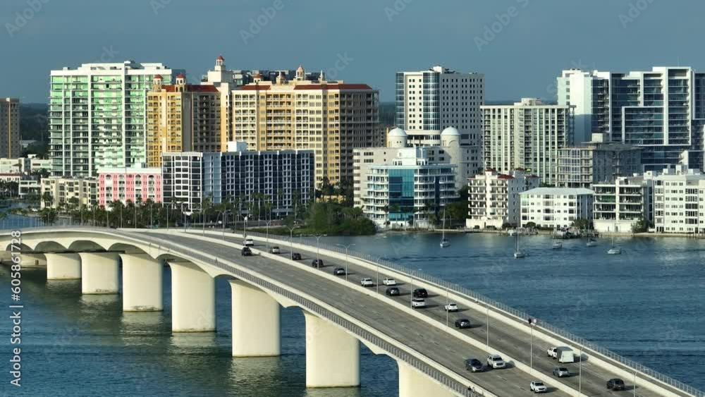 Sarasota city downtown with Ringling Bridge and expensive waterfront high-rise buildings in Florida. Urban travel destination in the USA Sarasota city downtown with Ringling Bridge and expensive waterfront high-rise buildings in Florida. Urban travel destination in the USA