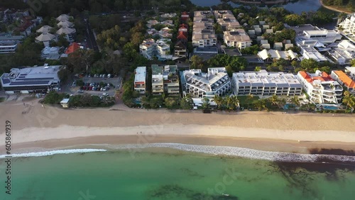 Aerial view from the ocean with pan in a northerly direction across Noosa Main beach to the groyne photo