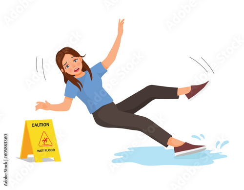 Young woman having accident slipping on wet floor and falling down near yellow caution sign
