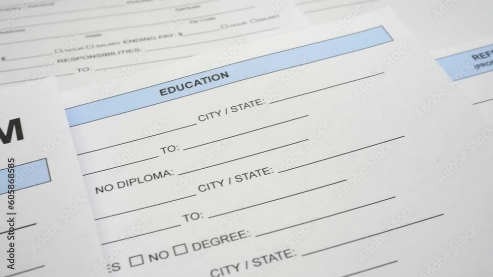A panning shot of an application form shows blank details before filling in the information, accompanied by a black pen with a signature space. The concepts of job application, human resources, employ A panning shot of an application form shows blank details before filling in the information, accompanied by a black pen with a signature space. The concepts of job application, human resources, employ