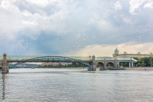 Fototapeta Naklejka Na Ścianę i Meble -  View of the Moscow river embakment, Pushkinsky bridge and cruise ships at sunset.