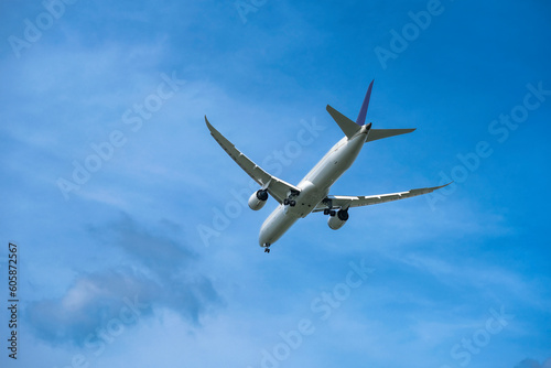 Passenger planes flying in the sky preparing to land at the airport airplane travel and international travel concept