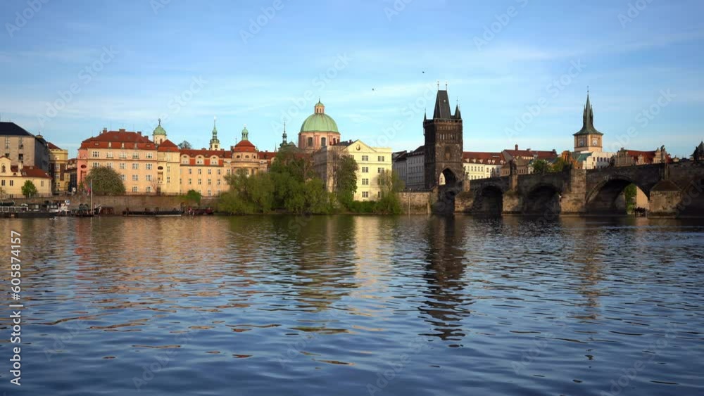View of the Vltava River and Charles Bridge on a sunny day in the center of Prague in summe View of the Vltava River and Charles Bridge on a sunny day in the center of Prague in summe