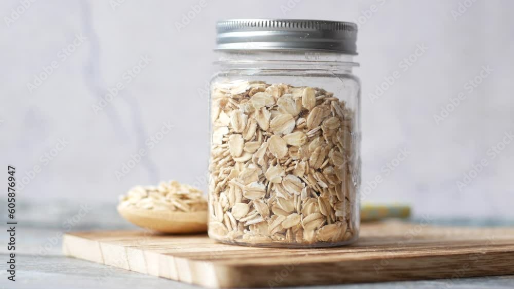 roasted oats flakes in a jar on table roasted oats flakes in a jar on table