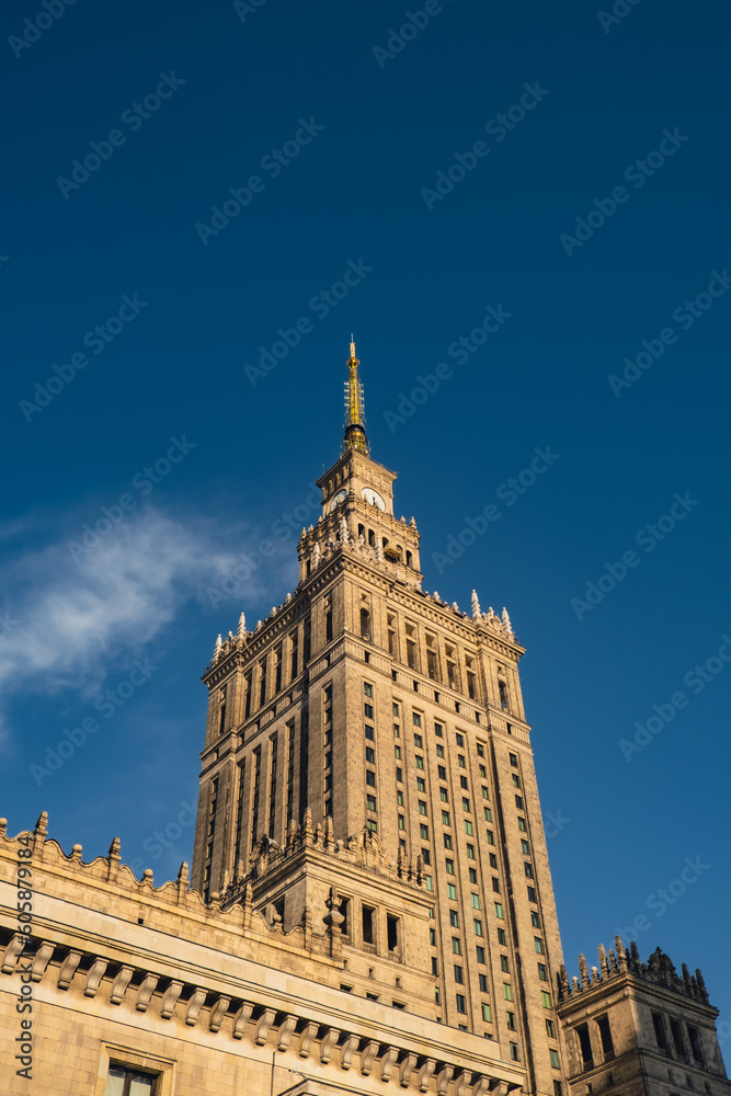 The Palace of Culture and Science Beautiful architecture of Warszawa city center with Palace of Culture at sky background. One of the main symbols of Warsaw skyline. Travel destinations tourist