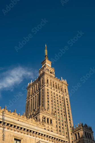 The Palace of Culture and Science Beautiful architecture of Warszawa city center with Palace of Culture at sky background. One of the main symbols of Warsaw skyline. Travel destinations tourist © anna.stasiia