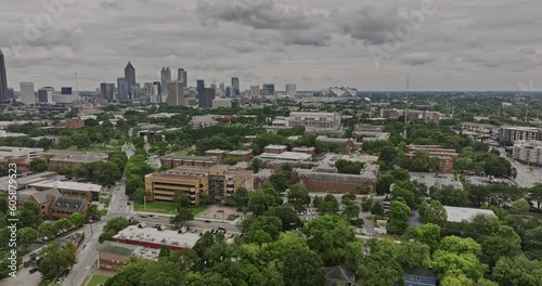 Atlanta Georgia Aerial v854 flyover Georgia Tech campus capturing building blocks, residence hall, sports center and fields with views of downtown cityscape - Shot with Mavic 3 Cine - August 2022 photo