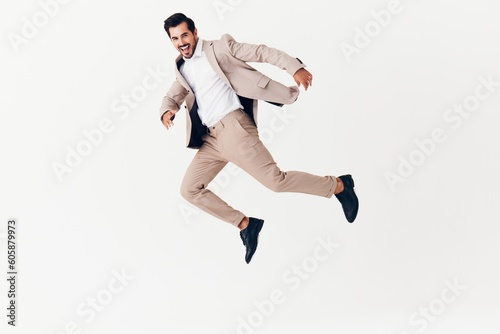 man smiling victory business jumping businessman beige suit running happy winner