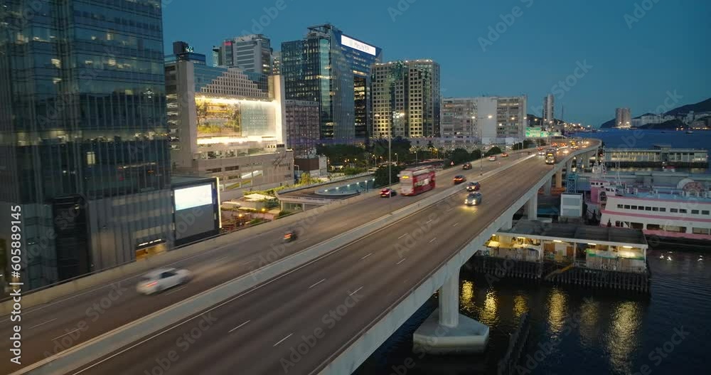 Cars Driving Over Bridge,Traffic on Kwun Tong Bypass, Hong Kong, Cinematic Aerial Wide Angle, After Sunset Cars Driving Over Bridge,Traffic on Kwun Tong Bypass, Hong Kong, Cinematic Aerial Wide Angle, After Sunset