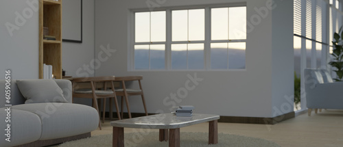 Comfortable and minimal living room with comfy cushions, coffee table on a carpet