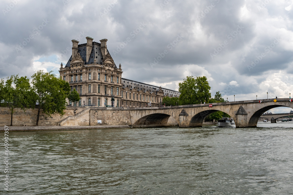 Louvre museum and Pont Royal from the Seine, in Paris, France Louvre museum and Pont Royal from the Seine, in Paris, France