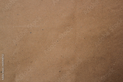 Brown paper texture close detailed background, shiny brown paper surface