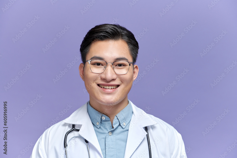 Asian male doctor portrait on purple background Asian male doctor portrait on purple background
