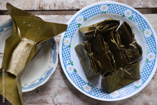 Barongko is a typical food from the Makassar Bugis tribe in South Sulawesi. made from mashed bananas with a mixture of eggs and vanilla and then wrapped in banana leaves and steamed. photo