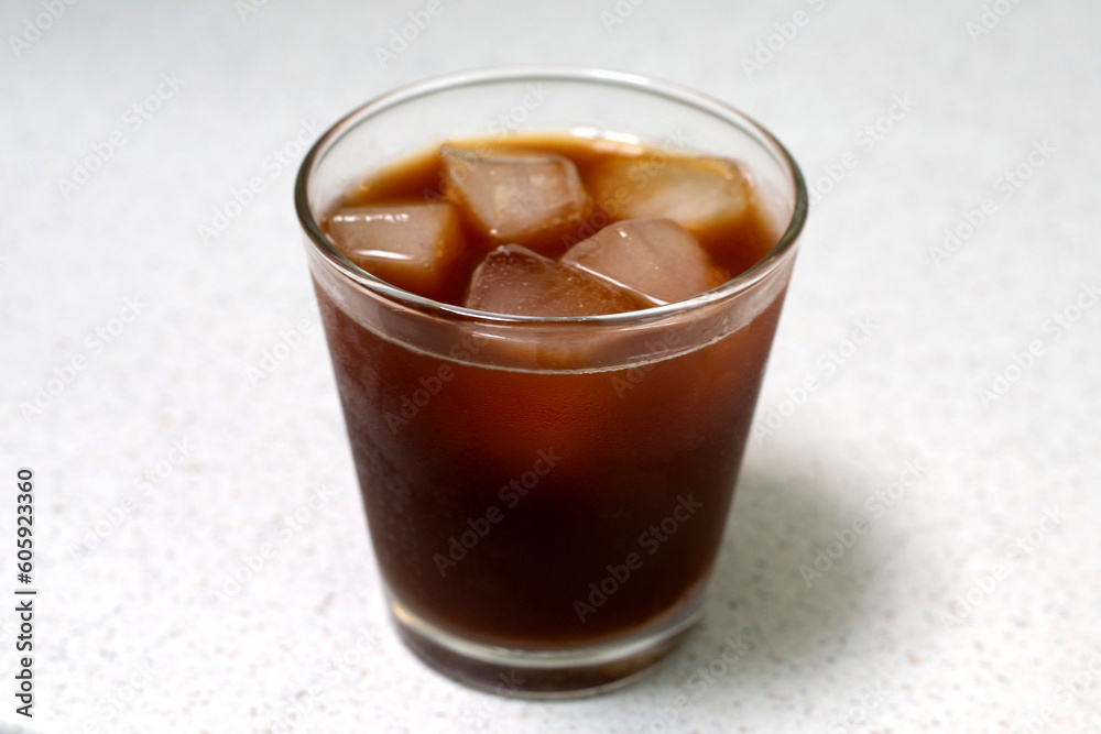 Iced black coffee on white background. Iced black coffee on white background.